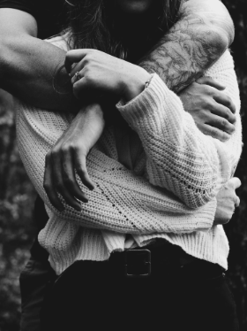 A man and a woman hugging each other